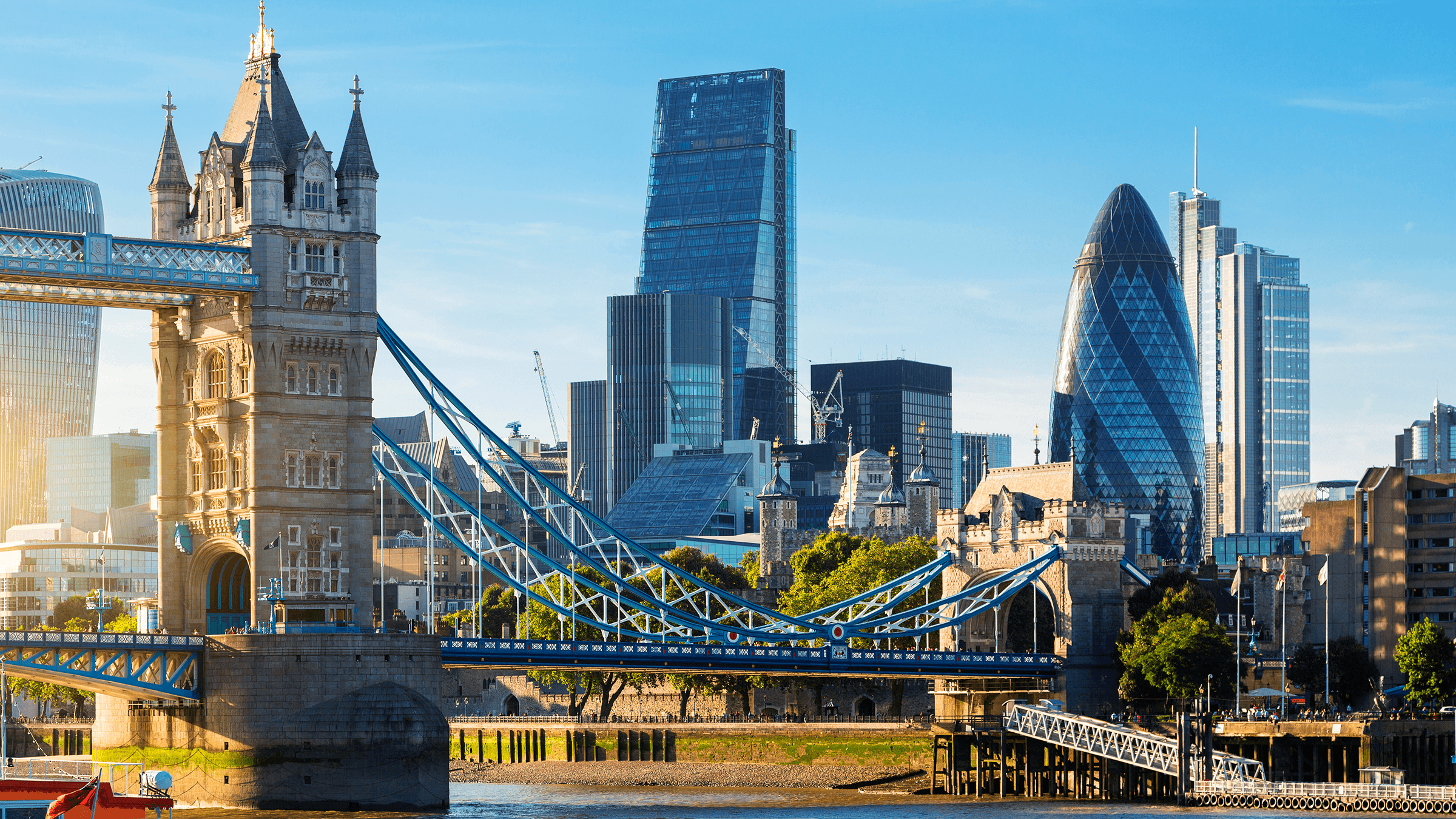 an image of the City of London skyline with Tower Bridge in the foreground